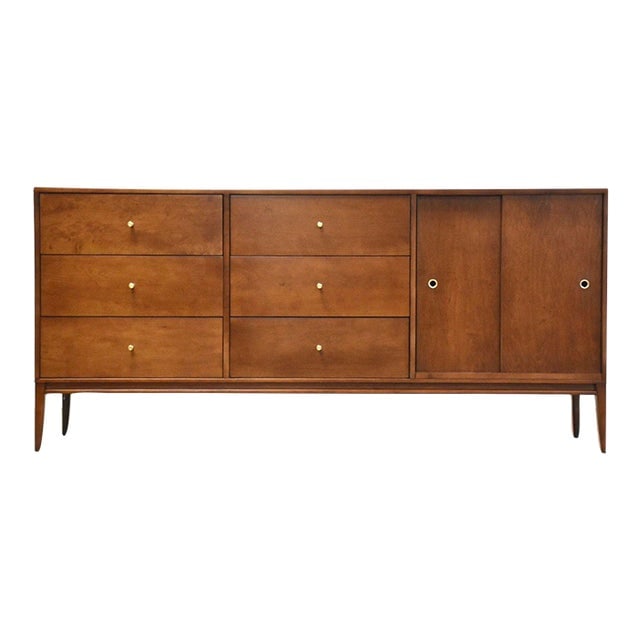 Paul McCobb Planner Group Credenza: Paul McCobb Planner Group Credenza A mid century modern solid maple sideboard credenza designed by Paul McCobb for Winchendon's Planner Group with brass knobs and two sliding doors. Professionally ref