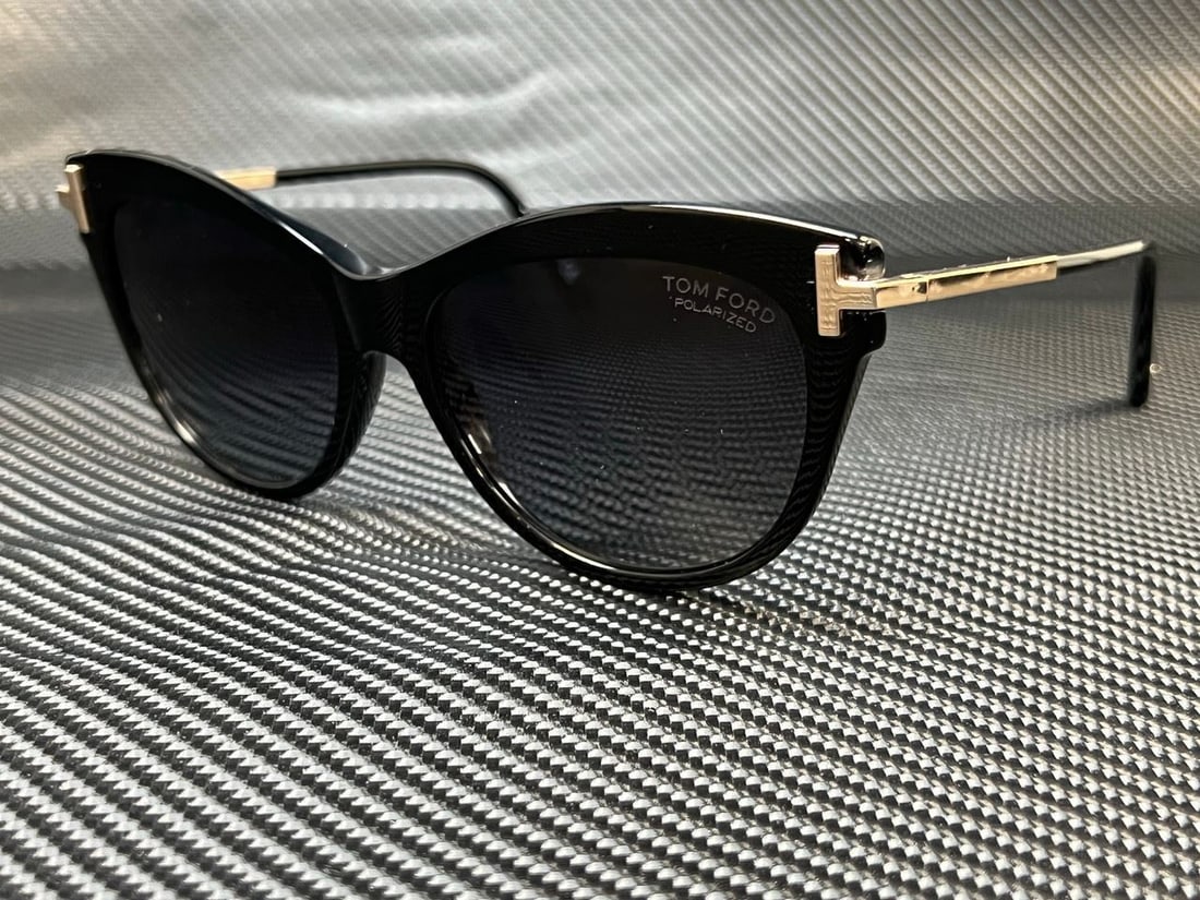 TOM FORD Kira FT0821 01D Black Smoke Polarized Womens 56 mm Sunglasses: TOM FORD Kira FT0821 01D Black Smoke Polarized Womens 56 mm Sunglasses Frame Color: Black Type: Sunglasses New The BIDHAUS Guarantee: All items in this auction are guaranteed to be 100% authentic. At