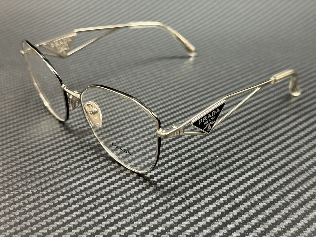 PRADA PR 52ZV 1BC1O1 Silver Womens 55 mm Eyeglasses: PRADA PR 52ZV 1BC1O1 Silver Womens 55 mm Eyeglasses Frame Color: Silver Type: Eyeglasses New The BIDHAUS Guarantee: All items in this auction are guaranteed to be 100% authentic. At Your Service: At B