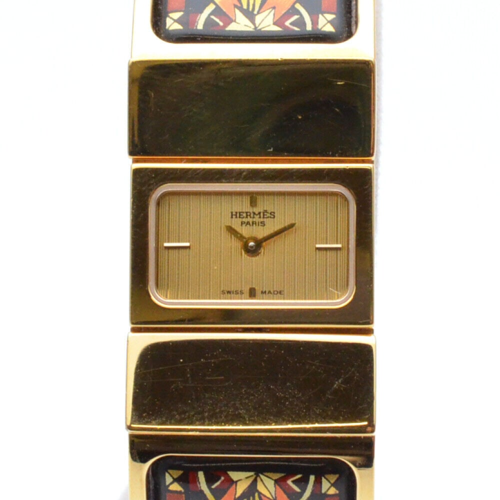 HERMES Location L01.201 Bangle Watch Ladies Watch: HERMES Location L01.201 Bangle Watch Ladies Watch Type: wristwatch Brand HERMES Model number L01.201 Product name Location Color Dial: gold Belt: gold x black specification Movement: quartz Case: GP x