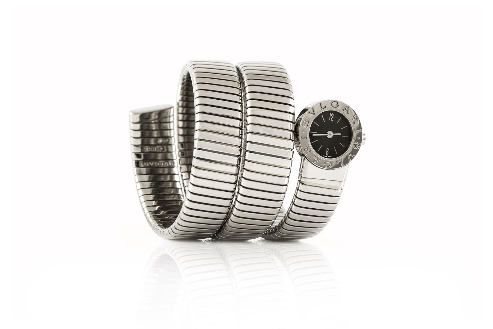 Bvlgari Tubogas Watch: Bvlgari Tubogas Watch BVLGARI Tubogas ladies' quartz watch finely crafted in stainless steel and black lacquered dial Swiss made. The BIDHAUS Guarantee: All items in this auction are guaranteed to be