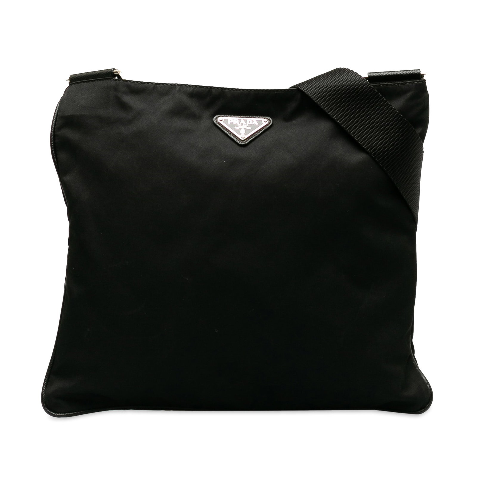 Prada Tessuto Crossbody Bag: Prada Tessuto Crossbody Bag This crossbody bag features a nylon body a flat shoulder strap a top zip closure and an interior zip pocket. Brand: Prada Model: Tessuto Crossbody Bag Origin: Iran Category
