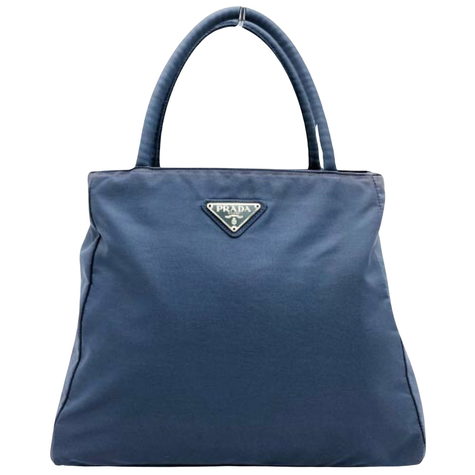 Prada Tessuto: Prada Tessuto Brand: Prada Model: Tessuto Color: Blue Material: Synthetic Dimensions: 25.5cm x 31cm Country of Origin: Italy Comments: The Prada Tessuto tote in blue nylon embodies the sophistication 