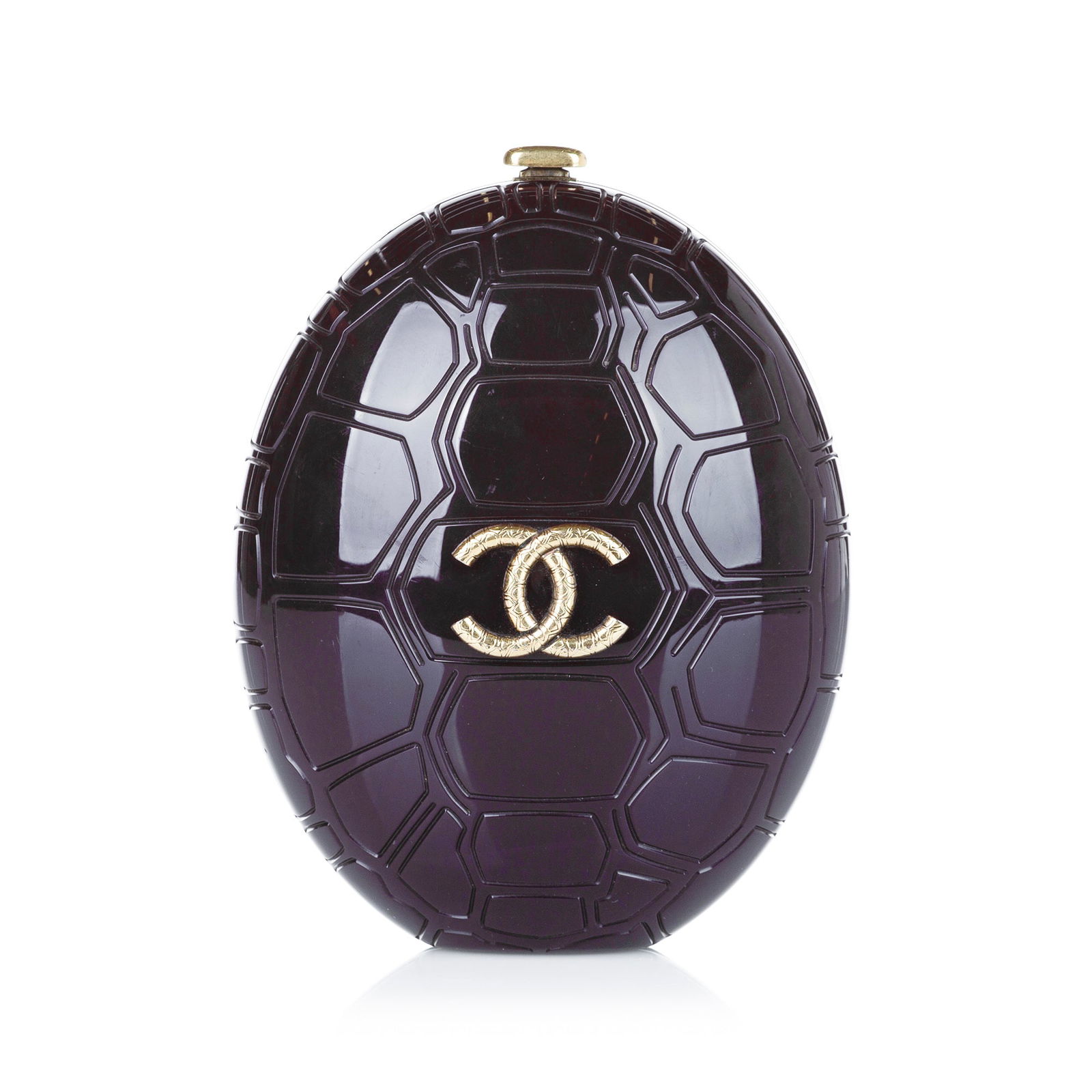 Chanel Plexiglass Turtle Shell Minaudiere: Chanel Plexiglass Turtle Shell Minaudiere This crossbody bag features a plexiglass body a metal chain strap and a kiss lock closure. Brand: Chanel Model: Plexiglass Turtle Shell Minaudiere Origin: Ita