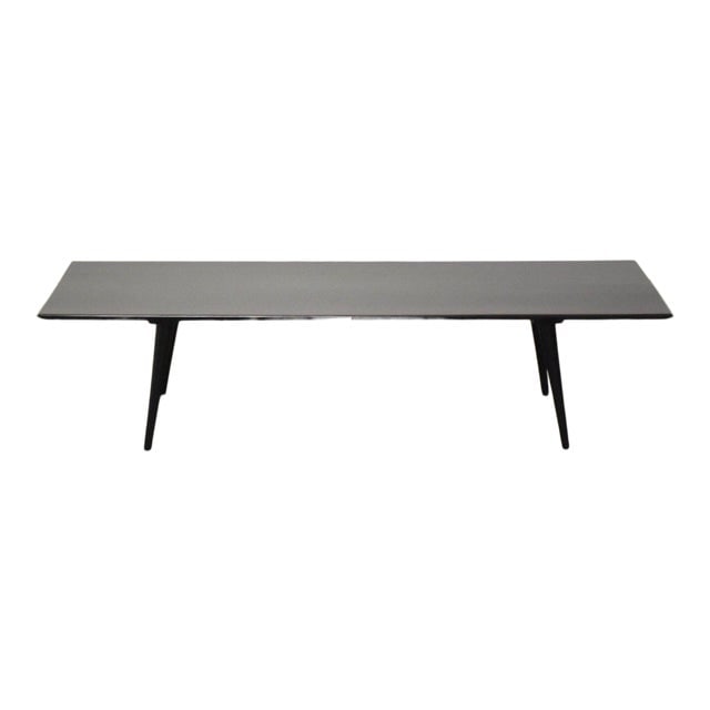 Paul McCobb Planner Group Black Coffee Table: Paul McCobb Planner Group Black Coffee Table A mid century modern black lacquer coffee table designed by Paul McCobb for Winchendon Furniture's "Planner Group" collection. 60" wide. 18.25" deep. 14.75