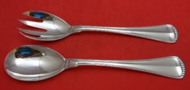 Milano by Buccellati Italian Sterling Silver Salad Serving Set 2pc Ovoid 9 3/4": Milano by Buccellati Italian Sterling Silver Salad Serving Set 2pc Ovoid 9 3/4" Pre-Owned PLEASE NOTE: LOCAL PICK UP IS NOT AN OPTION AND ALL ITEMS IN THIS AUCTION MUST BE SHIPPED. We offer Free Shipp