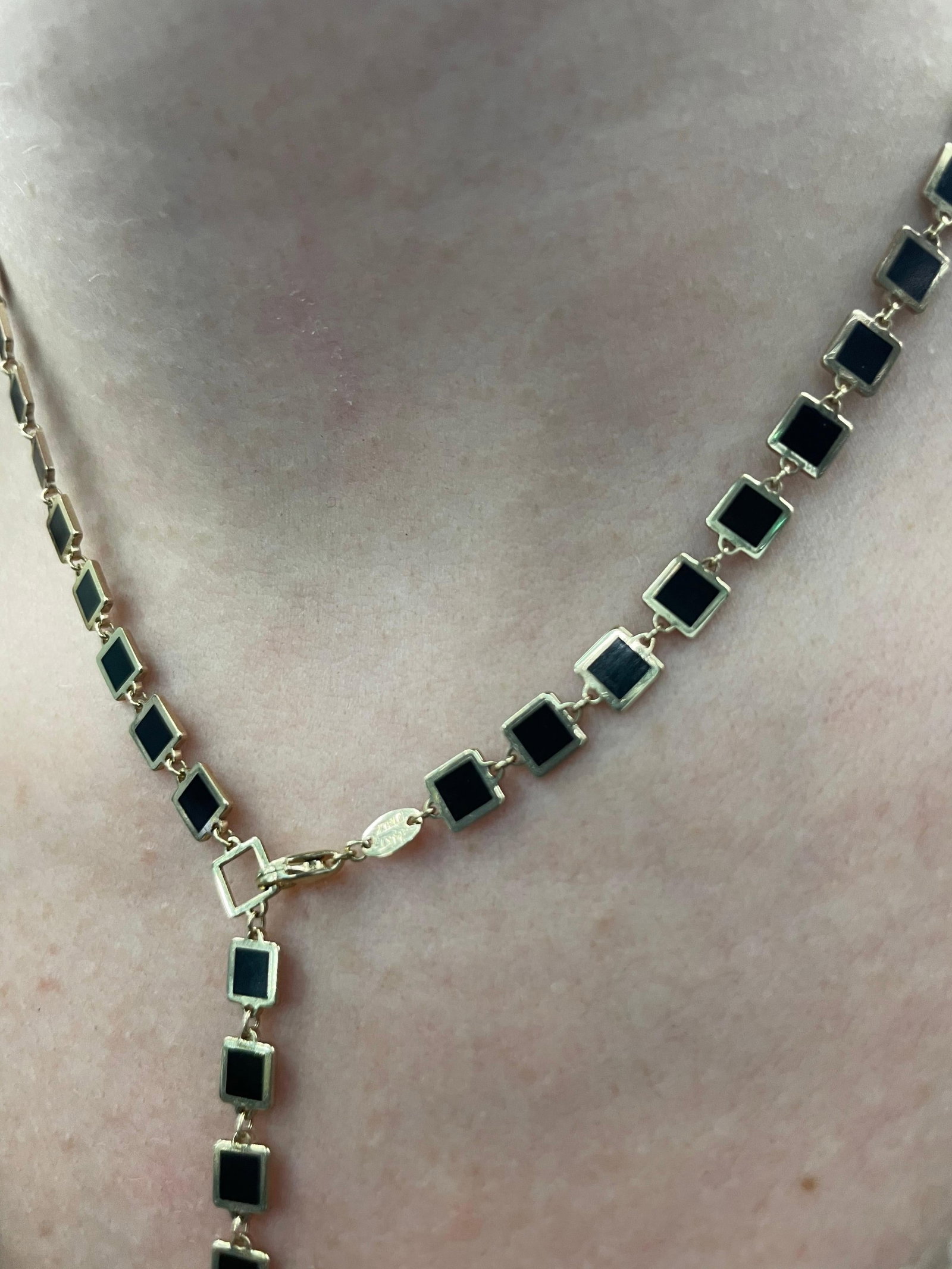 Italian Onyx Gold Trim Square Necklace 14 Karat Yellow Gold: Italian Onyx Gold Trim Square Necklace 14 Karat Yellow Gold Creator: Harbor Diamonds Metal: 14k Gold Yellow Gold Stone: Onyx Stone Cut: Square Cut Weight: 9 g Dimensions: Length: 17 in (431.8 mm) Styl