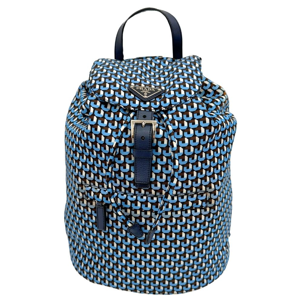 Prada Tessuto: Prada Tessuto Brand: Prada Model: Tessuto Color: Blue Material: Synthetic Dimensions: H 32cm x W 26cm x D 15cm : Enter the world of elegant functionality with Prada's Tessuto backpack a piece that red