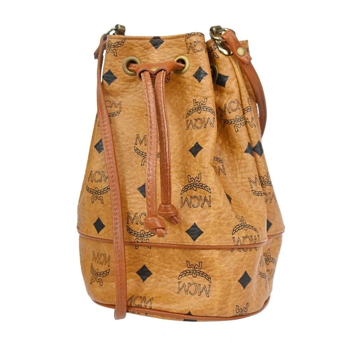 MCM Visetos: MCM Visetos Brand: MCM Model: Visetos Color: Camel Material: Leather Dimensions: W 15 x H 21 x D 15 cm : The MCM Visetos shoulder bag offers a stylish contemporary design tailored for fashion-forward