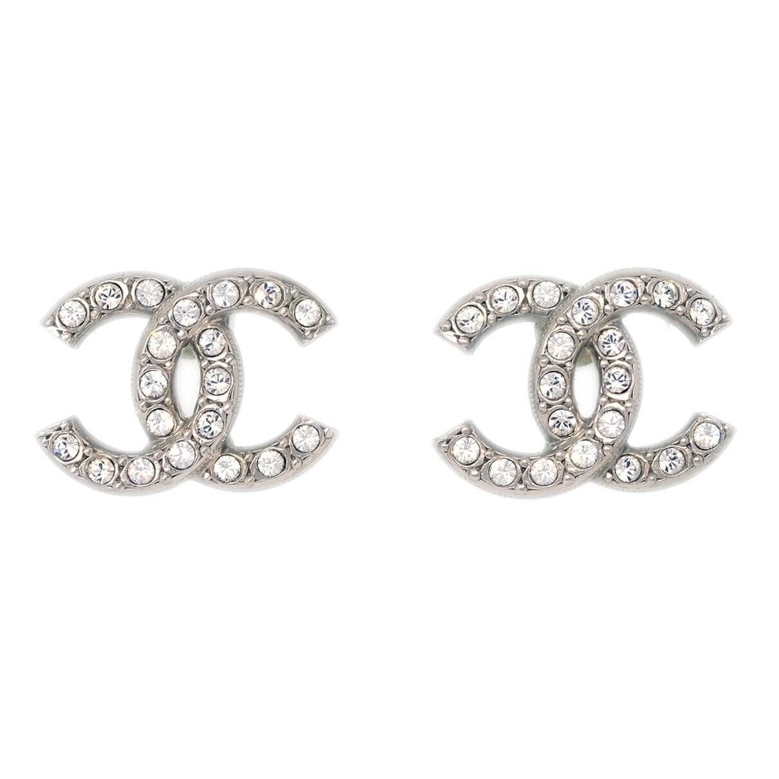 Chanel Piercing Earrings Rhinestone Silver C21A: Chanel Piercing Earrings Rhinestone Silver C21A Type: Earrings Closure: Screw Back (pierced) Color: Silver Style: Piercing Material: Rhinestone Outside Condition: AB: Very Good/Inside Condition: C: He