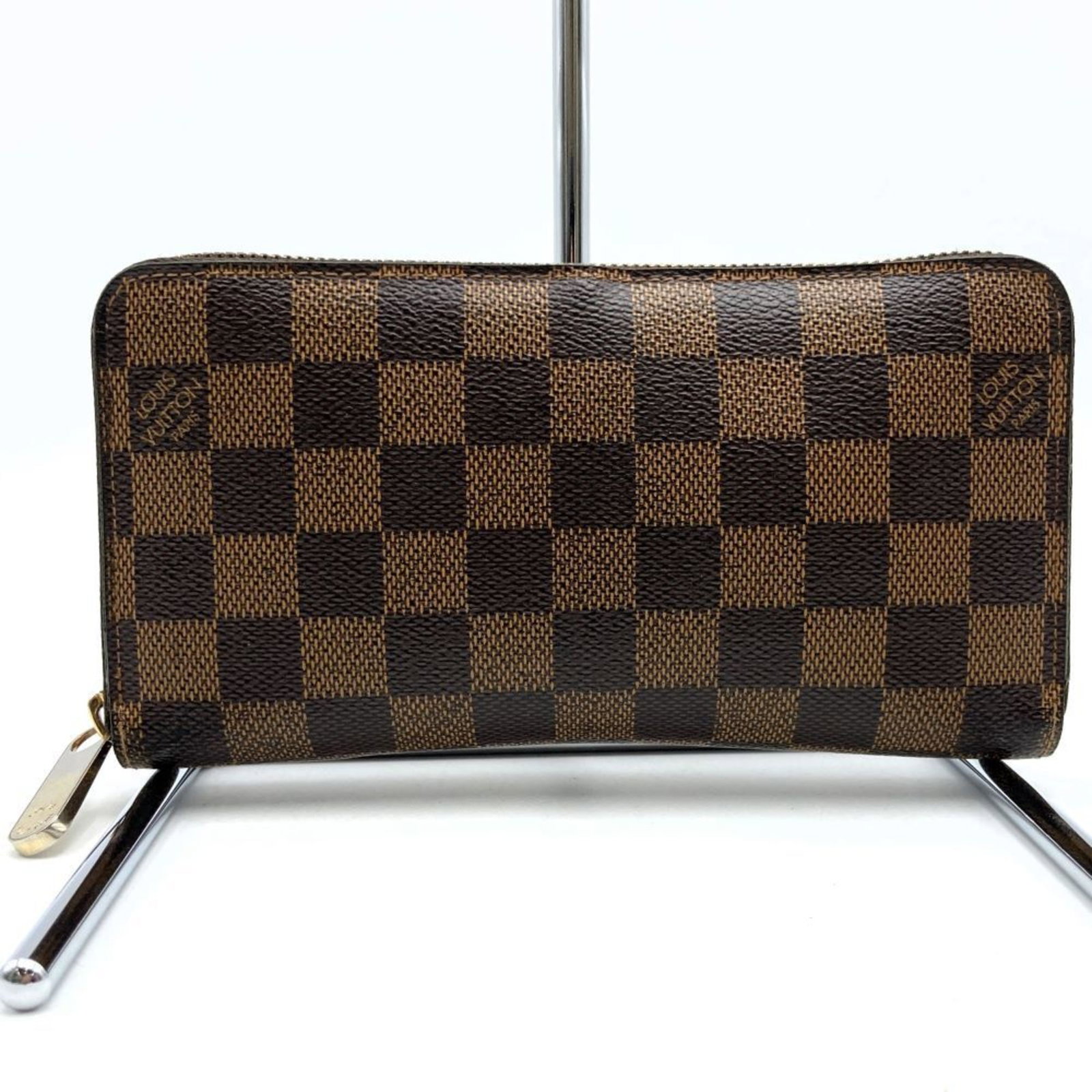 Louis Vuitton N60015 Zippy Wallet Long Brown Damier Ebene LOUIS VUITTON: Louis Vuitton N60015 Zippy Wallet Long Brown Damier Ebene LOUIS VUITTON Brand: Louis Vuitton Line: Damier Model: N60015 Type: Long wallet (bi-fold) Gender: Women Material: Damier Canvas Damier Canvas: