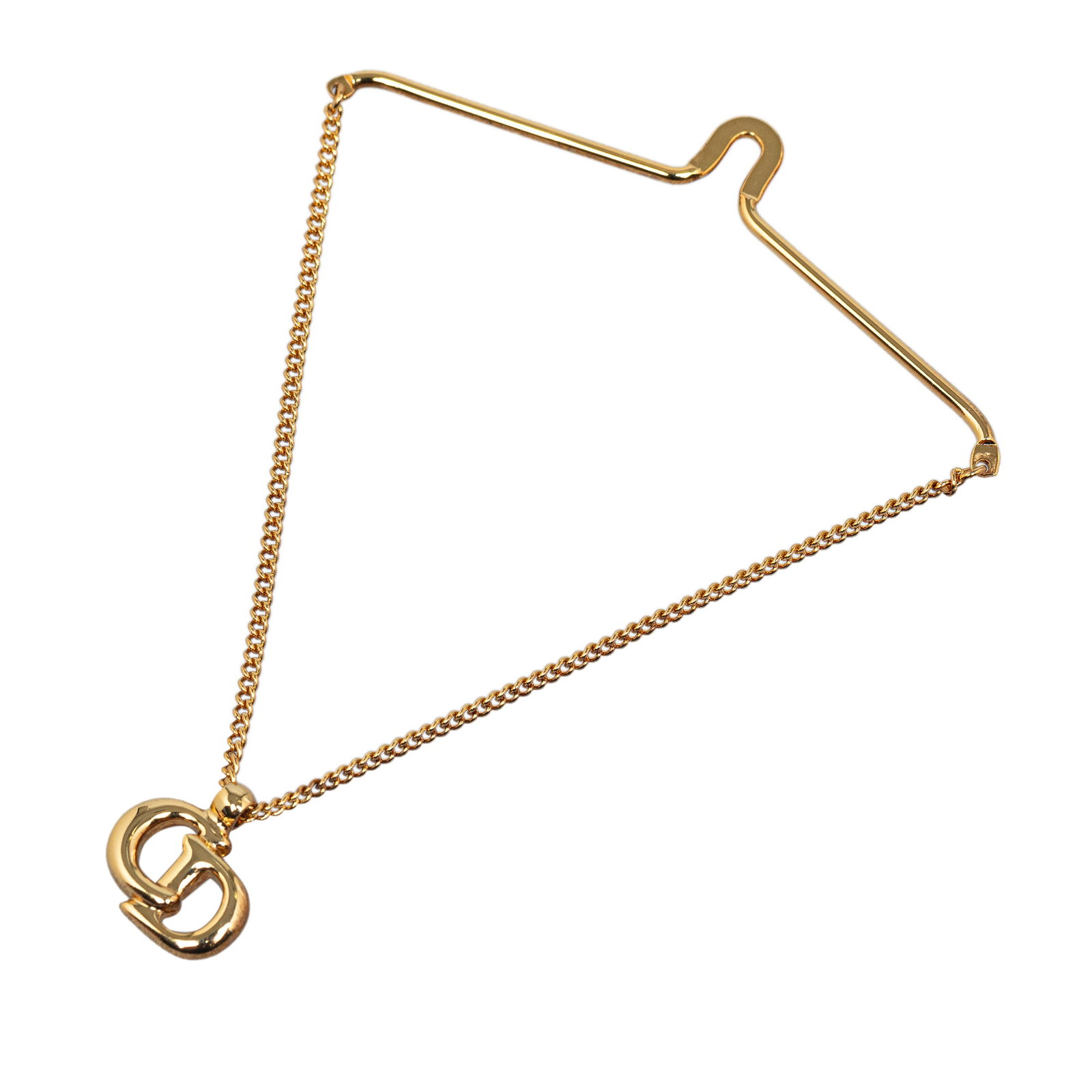 Dior Vintage CD Tie Chain: Dior Vintage CD Tie Chain This tie chain features a gold-tone chain and hardware. Brand: Dior Model: Vintage CD Tie Chain Origin: Italy Category: Accessories Color: Gold Style: Material: Metal Conditi