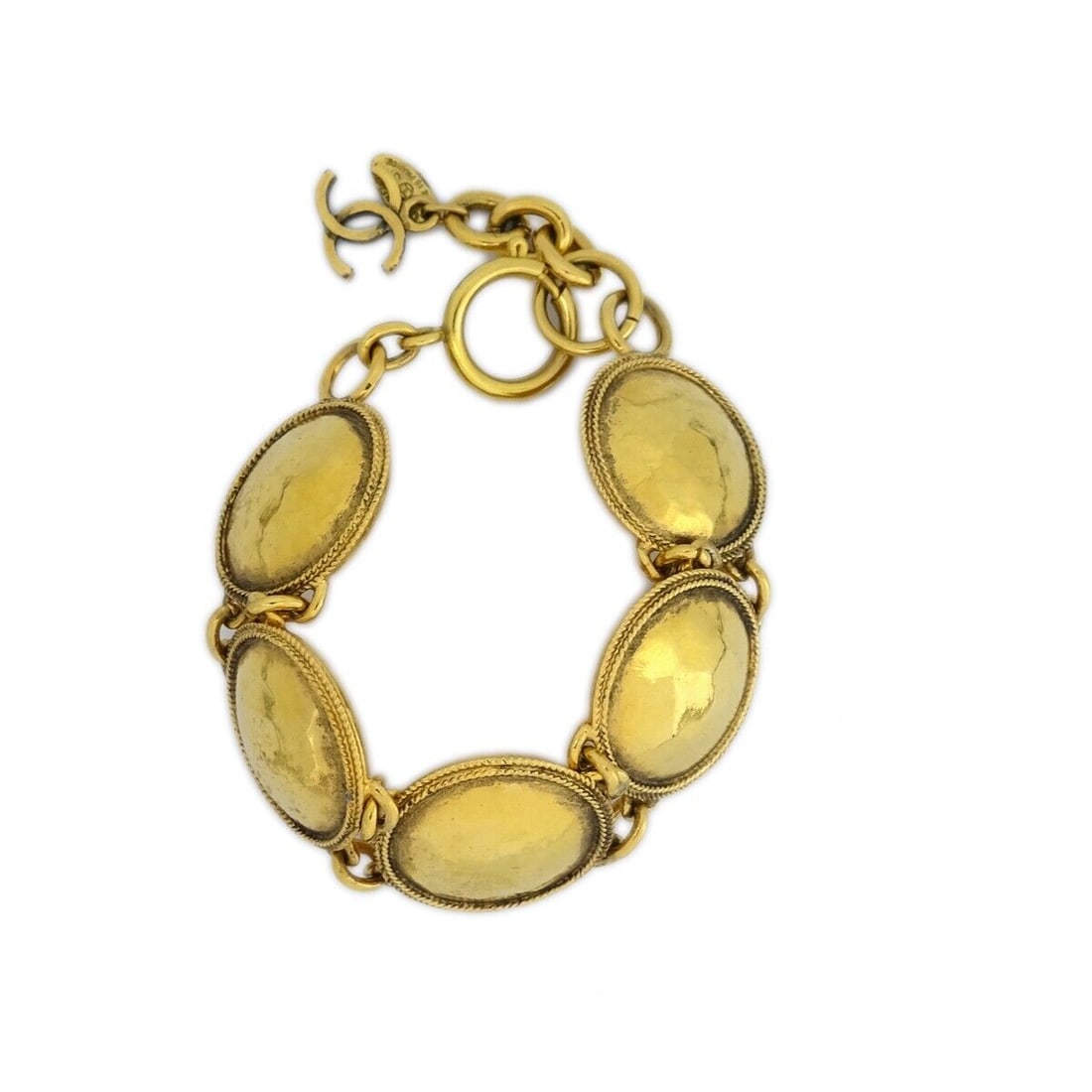 Chanel Medallion Bracelet Gold 23/4214: Chanel Medallion Bracelet Gold 23/4214 Type: Bracelet Color: Gold Style: Chain Material: Gold-plated Outside Condition: AB: Very Good/Inside Condition: C: Heavily Used The BIDHAUS Guarantee: All items