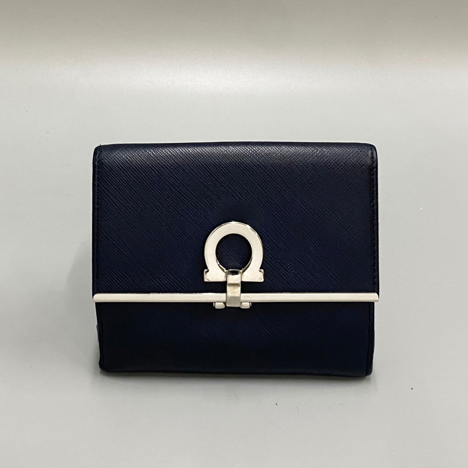 Salvatore Ferragamo Gancini Leather Genuine Trifold Wallet Mini Navy: Salvatore Ferragamo Gancini Leather Genuine Trifold Wallet Mini Navy Brand: Salvatore Ferragamo Type: Wallet (tri-fold) Gender: Women Material: Leather Leather: Color: Navy Size (HxWxD): 10cm x 12cm x