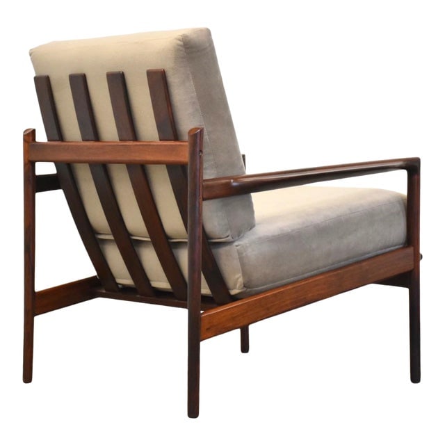 Kofod Larsen Rosewood Lounge Chair with New Brown Suede Cushions: In Kofod Larsen for Selig Rosewood Lounge Chair A beautiful picket back solid Brazilian rosewood lounge chair designed by Ib Kofod Larsen for Selig Furniture. New light brown micro suede cushions. Mad