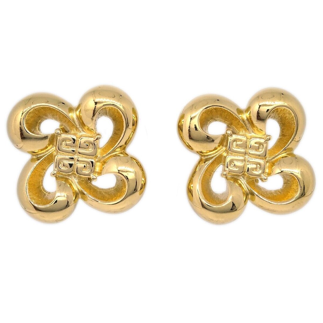Givenchy Gold Clip-On Earrings: Givenchy Earrings Clip-On Gold Type: Earrings Closure: Clip-On Color: Gold Style: Earrings Metal: Gold plated Outside Condition: AB: Very Good/Inside Condition: C: Heavily Used The BIDHAUS Guarantee: 