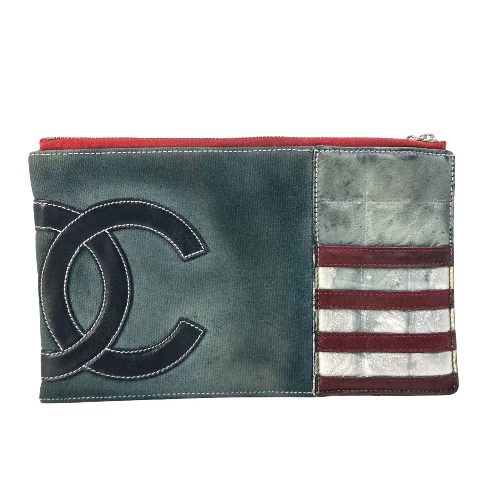 Chanel Navy Canvas Flap Bag W22cmxH13cm: Chanel Flap bag Brand: Chanel Model: Flap bag Color: Navy Material: Canvas Dimensions: W22cmxH13cm Comments: The Chanel Flag pouch is a stylish and versatile accessory crafted from durable navy canvas