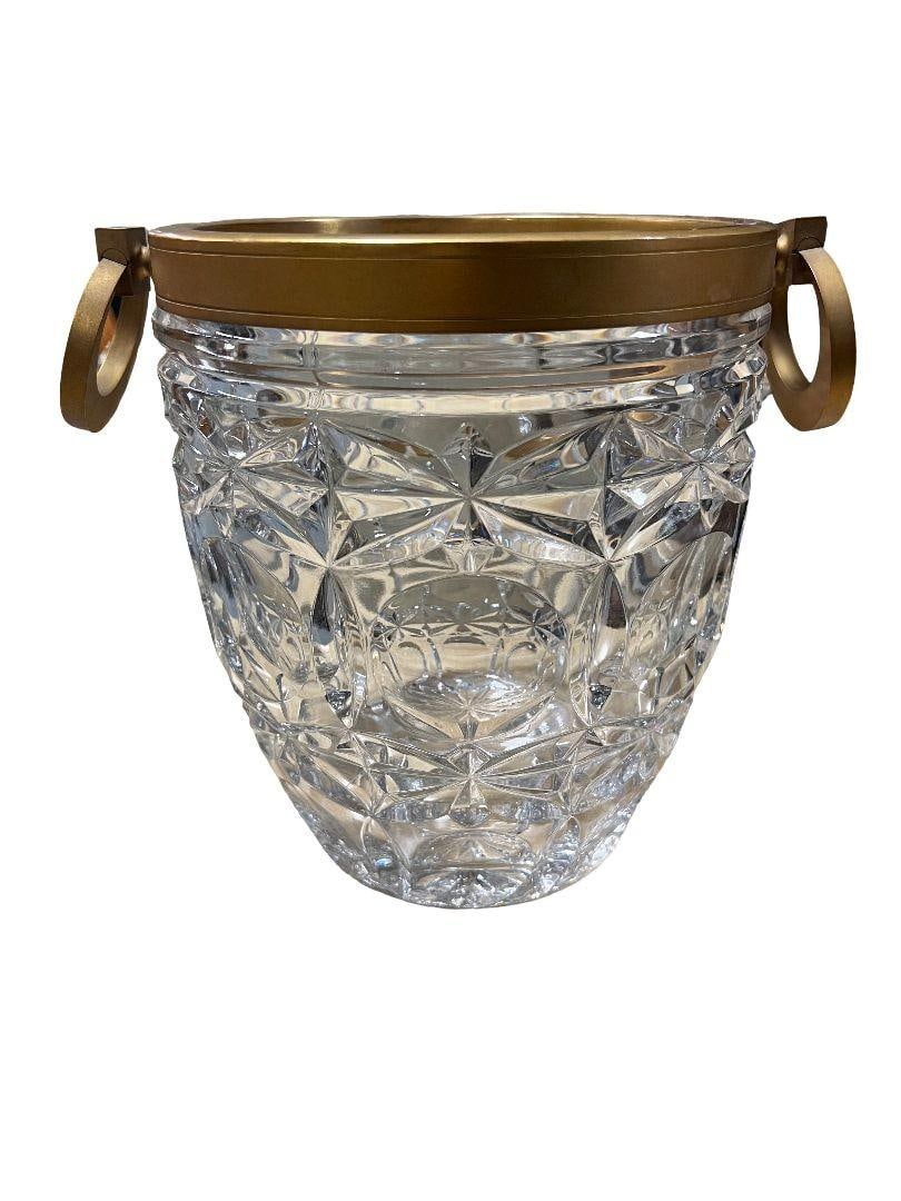 Mid-Century Brass & Cut Crystal Champagne Ice Bucket: This exquisite mid-century champagne ice bucket features a stunning combination of brass and cut crystal, reflecting the elegant design aesthetics of the 1950s. Perfect for entertaining, this piece ad