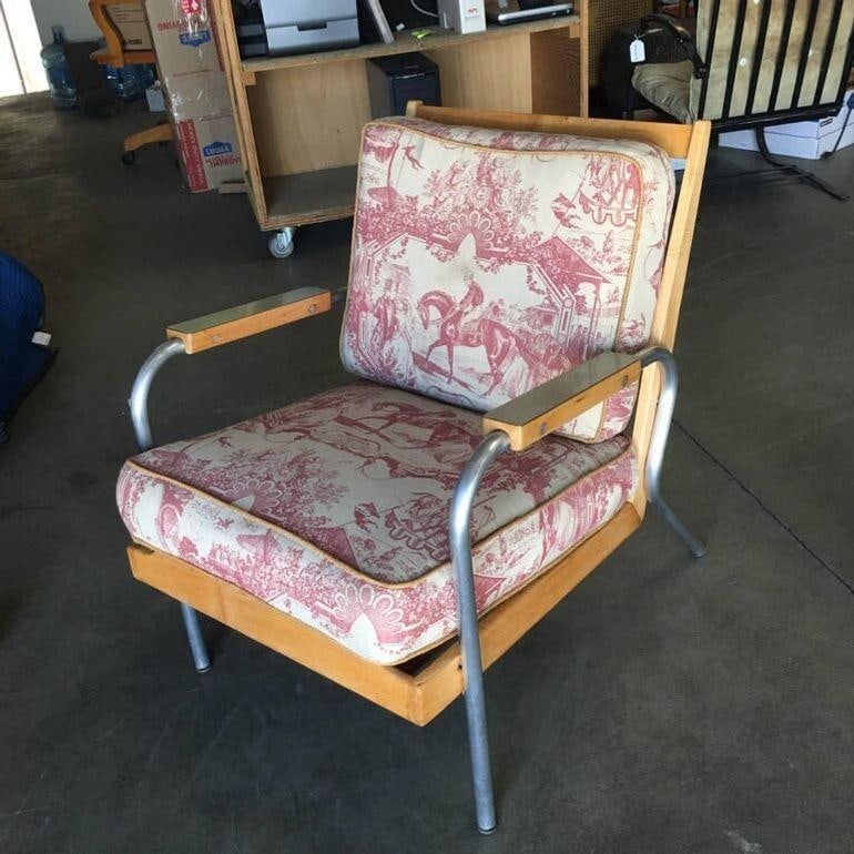 Midcentury Blonde Steel Lounge Chair: This midcentury lounge chair, influenced by the style of Francois Caruelle, features a sleek blonde design crafted from durable steel. Originating from the United States, this piece dates back to the