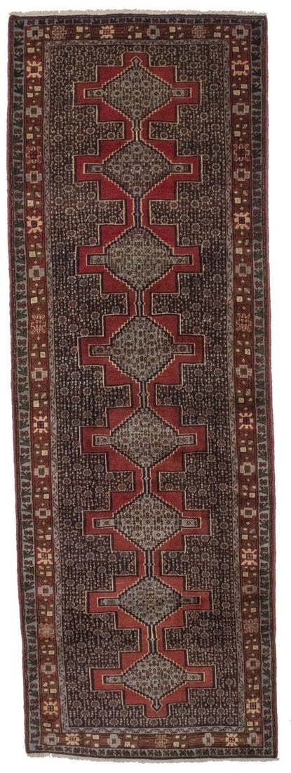 Handmade Navy Blue Floral Runner Rug 3X9: This exquisite handmade Oriental runner rug features a striking geometric design with a floral pattern, rendered in navy blue, red, ivory, brown, and tan hues. Crafted from high-quality wool using a t