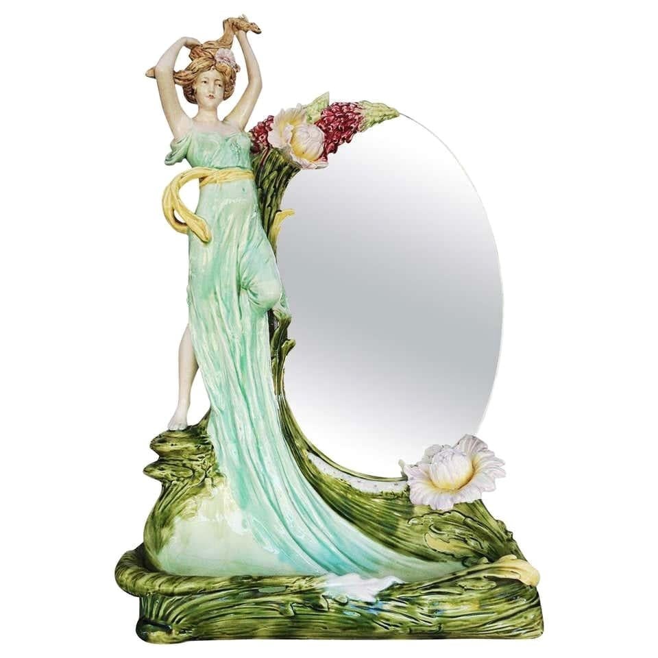 Hans Kieweg Art Nouveau Vanity Mirror: This exquisite Art Nouveau figural vanity mirror by Hans Kieweg for Fraureuth showcases a striking design from the 1910s. Crafted from ceramic, it embodies the modern style of the period, making it an