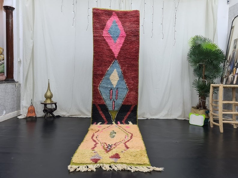 Handmade Moroccan Berber Runner Rug 2 x 10 ft: This exquisite handmade Moroccan Berber runner rug is crafted by skilled women weavers in the Middle Atlas Mountains. Made from 100% local sheep wool, this rug showcases the traditional weaving techni