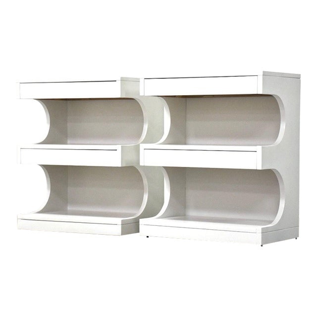 Drexel Mid-Century Modern White Nightstands Pair: Pair of mid-century modern white nightstands by Drexel, featuring two drawers each. These vintage pieces from the 1950s showcase an elegant design and are crafted from painted materials. Perfect for a