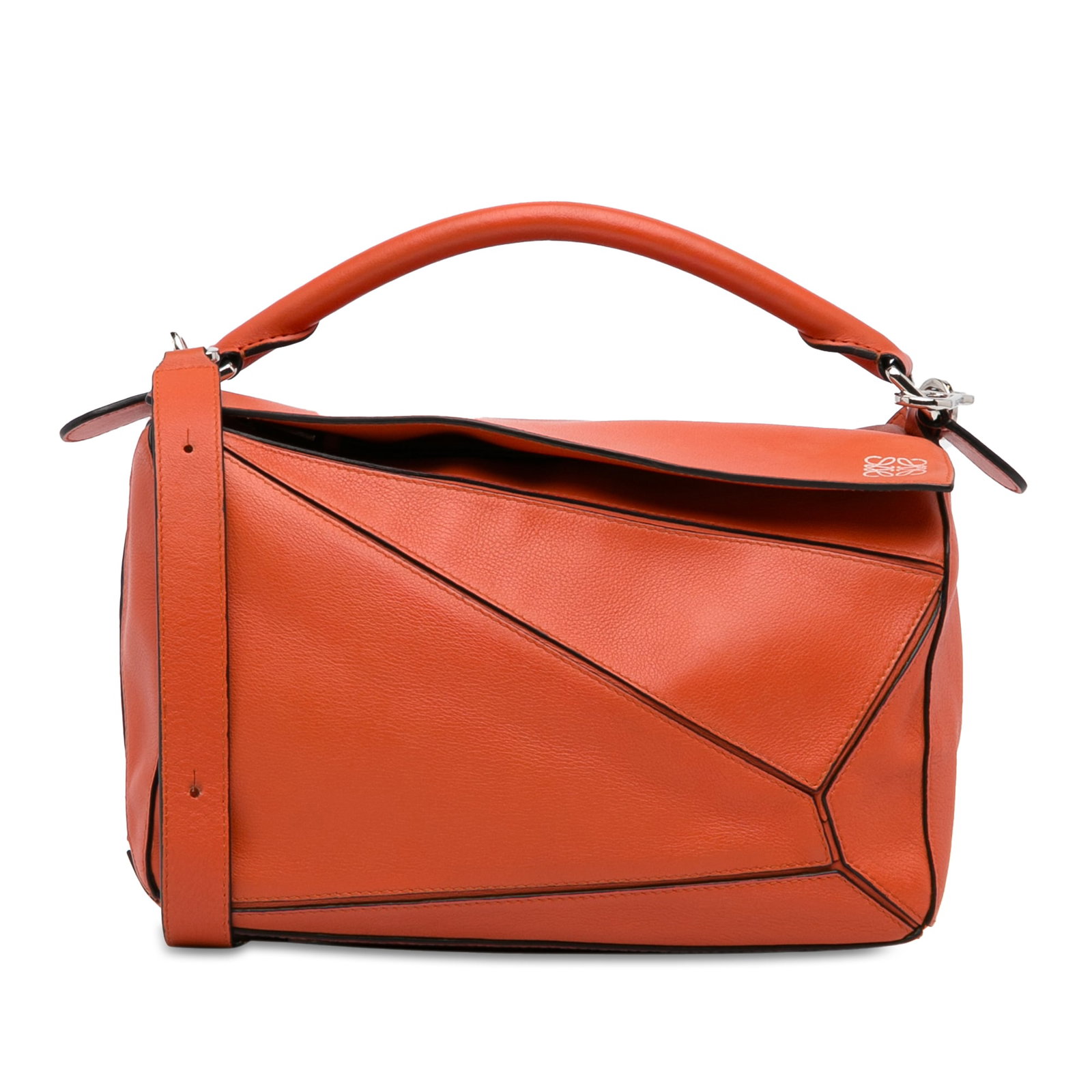 LOEWE Medium Puzzle Bag Orange Leather Satchel: LOEWE Medium Puzzle Bag The Puzzle bag features a leather body a rolled leather top handle a detachable flat leather strap a flap and top zip closure an exterior back zip pocket and interior slip pock