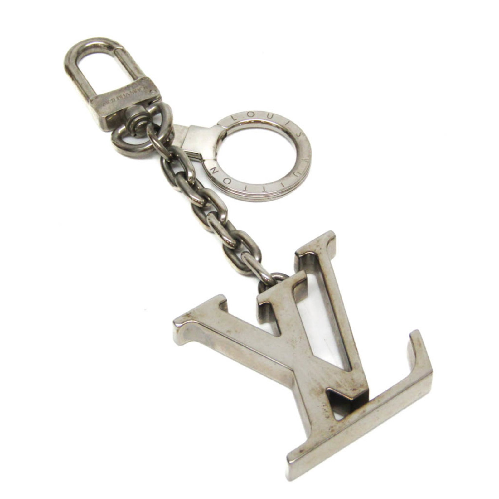 Louis Vuitton Silver Initial Key Chain Keyring M65071: Louis Vuitton Initial Key Chain M65071 Keyring (Silver) Brand: Louis Vuitton Model: Initial Key Chain M65071 Country of Origin: Italy Type: Keyring Gender: Men Women Color: Silver Material: Metal Size