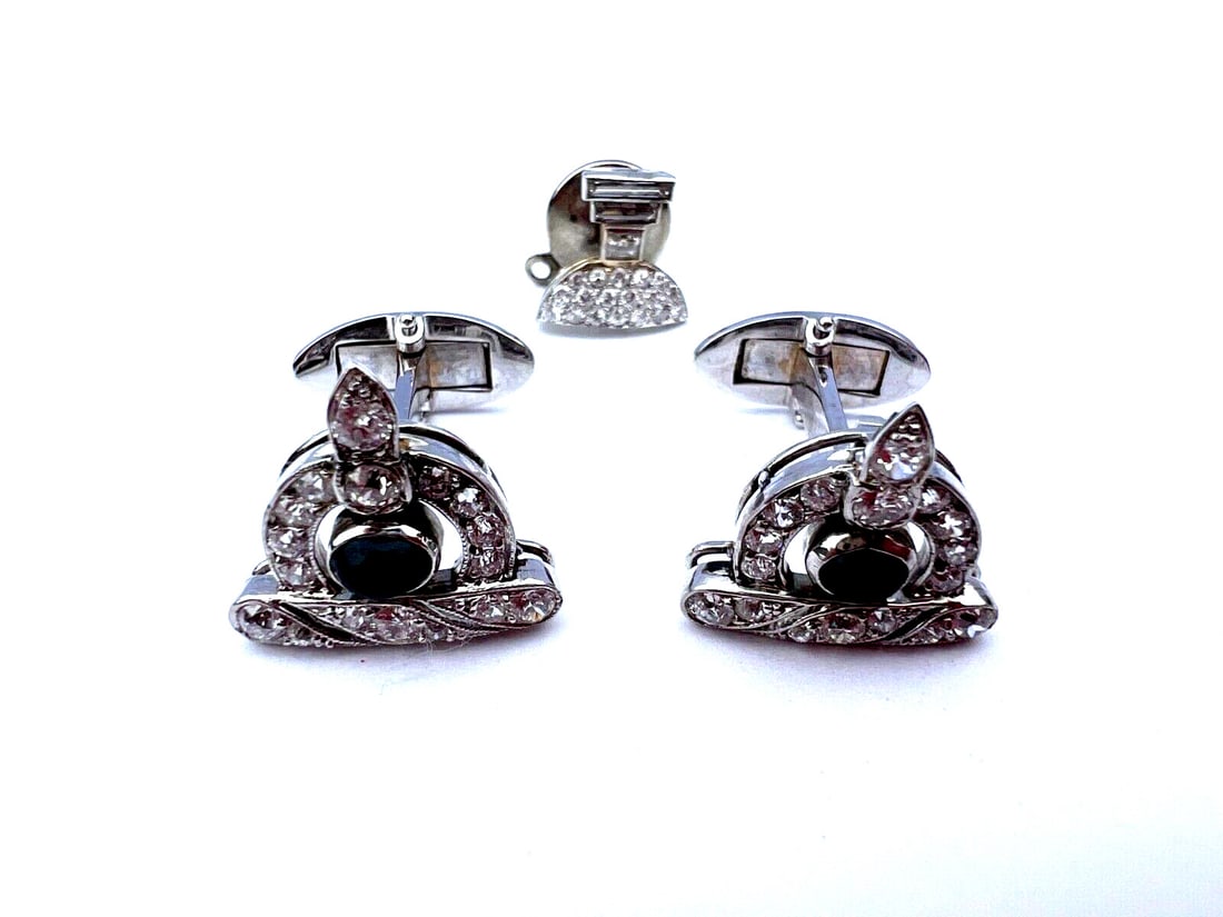 French Platinum Diamond Sapphire Cufflinks and Brooch Set: This exquisite French cufflinks and brooch set is crafted from high-quality 950 platinum, featuring stunning diamond and sapphire stones. The cufflinks have a sleek white finish with a diamond color g