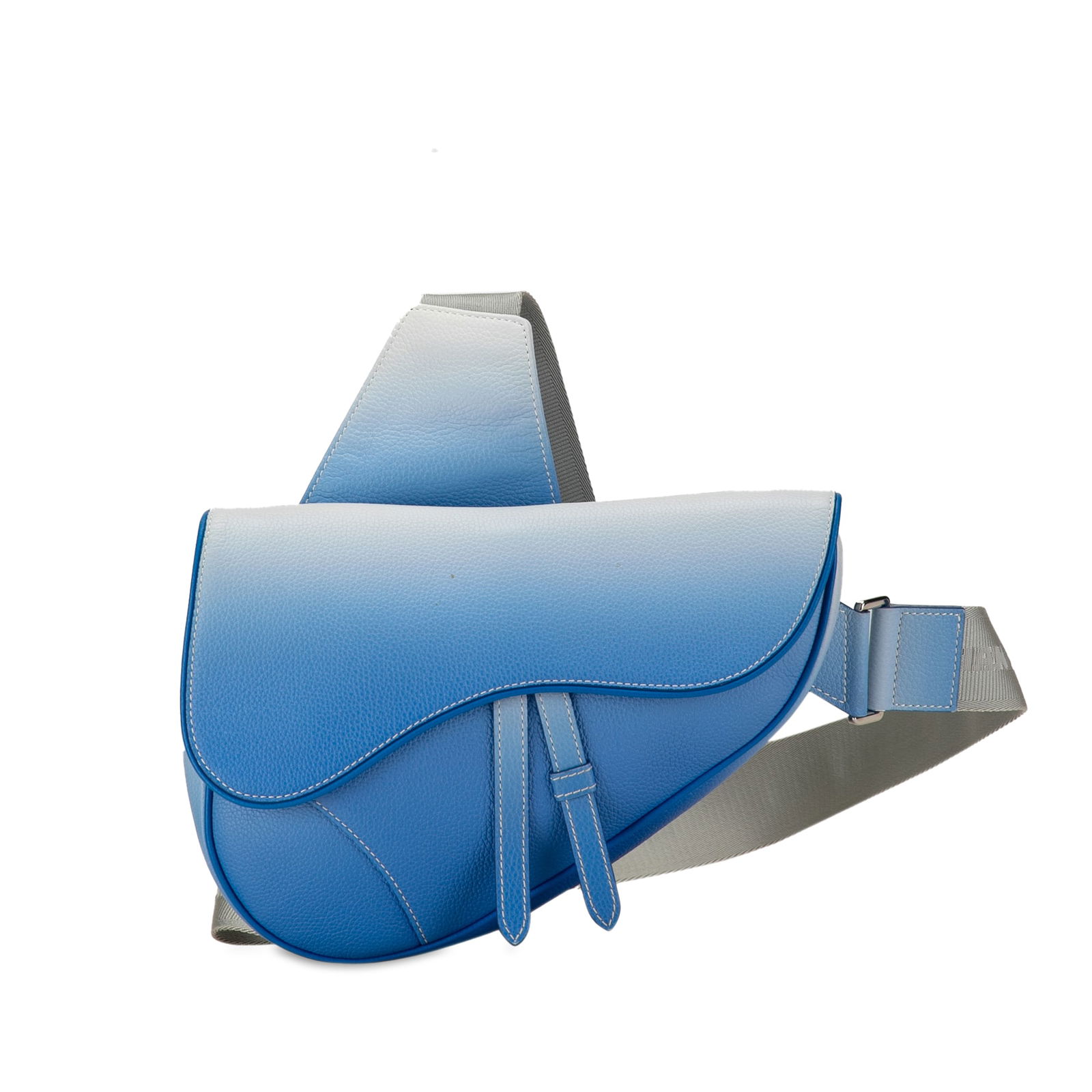 Dior x Daniel Arsham Grained Calfskin Gradient Saddle Bag: Dior x Daniel Arsham Grained Calfskin Gradient Saddle Bag The Saddle bag features a leather body a flat leather shoulder strap a front flap with a magnetic closure and an exterior back slip pocket. Br