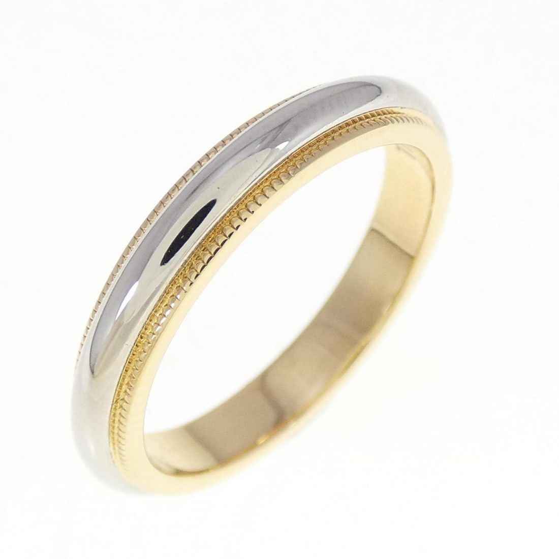 Tiffany & Co. Mirugurein Ring: Tiffany & Co. Mirugurein Ring Style: Ring Material: Platinum 750 Yellow Gold Gender: Unisex Size: 7.5-8 (US size) Accessories: No accessories Main Stone: No stones Weight: approx. 6.0g Actualsize: Max