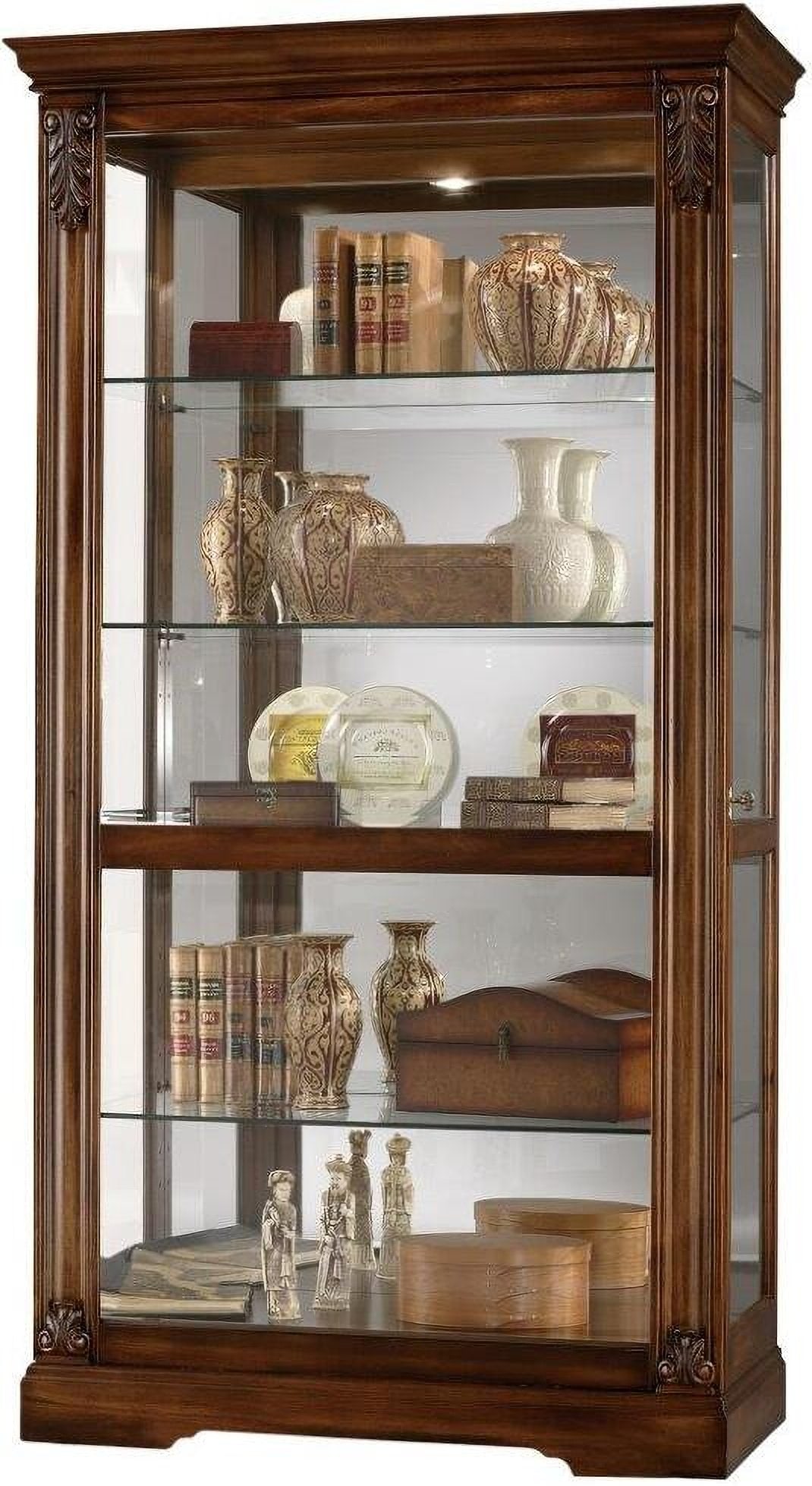 Howard Miller Andreus Curio Cabinet: Howard Miller Andreus Curio Cabinet Display your collectibles with the Andreus curio cabinet. It has a Tuscan Cherry finish and antique-style embellishments for a sophisticated look.Durable and Elegan