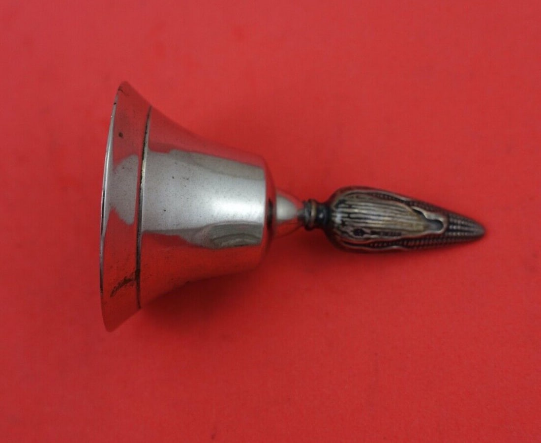 Webster Sterling Silver Dinner Bell 3in Corn Handle: Webster Sterling Silver Dinner Bell 3in Corn Handle This small dinner bell features a corn handle and is crafted from high-quality sterling silver. Made by Webster, it is in excellent condition and sh