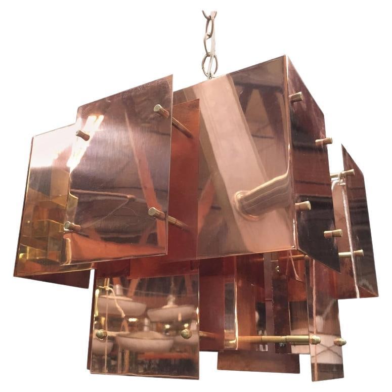 Robert Sonneman Cityscape Brutalist Chandelier Copper Steel 20in 16in 16in: Robert Sonneman Cityscape Brutalist Chandelier Copper Steel 20in 16in 16in This stunning Robert Sonneman designed "Cityscape" chandelier features a striking Brutalist style, crafted from copper and st