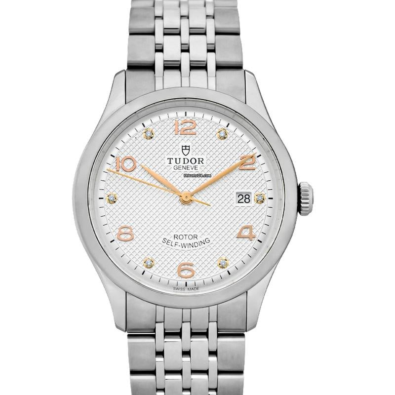 Tudor 1926 Automatic Silver Dial Stainless Steel Men's Watch: Tudor 1926 Automatic Silver Dial Stainless Steel Men's Watch The Tudor 1926 is a stylish automatic men's watch featuring a silver dial and a robust stainless steel case and bracelet. The case diameter