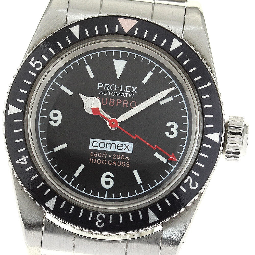 PRO-LEX Subpro Comex Men's Automatic Chronograph Watch: PRO-LEX Subpro Comex Men's Automatic Chronograph Watch The PRO-LEX Subpro Comex Men's Watch is an automatic chronograph wristwatch featuring a black dial and stainless steel case and belt. The watch h