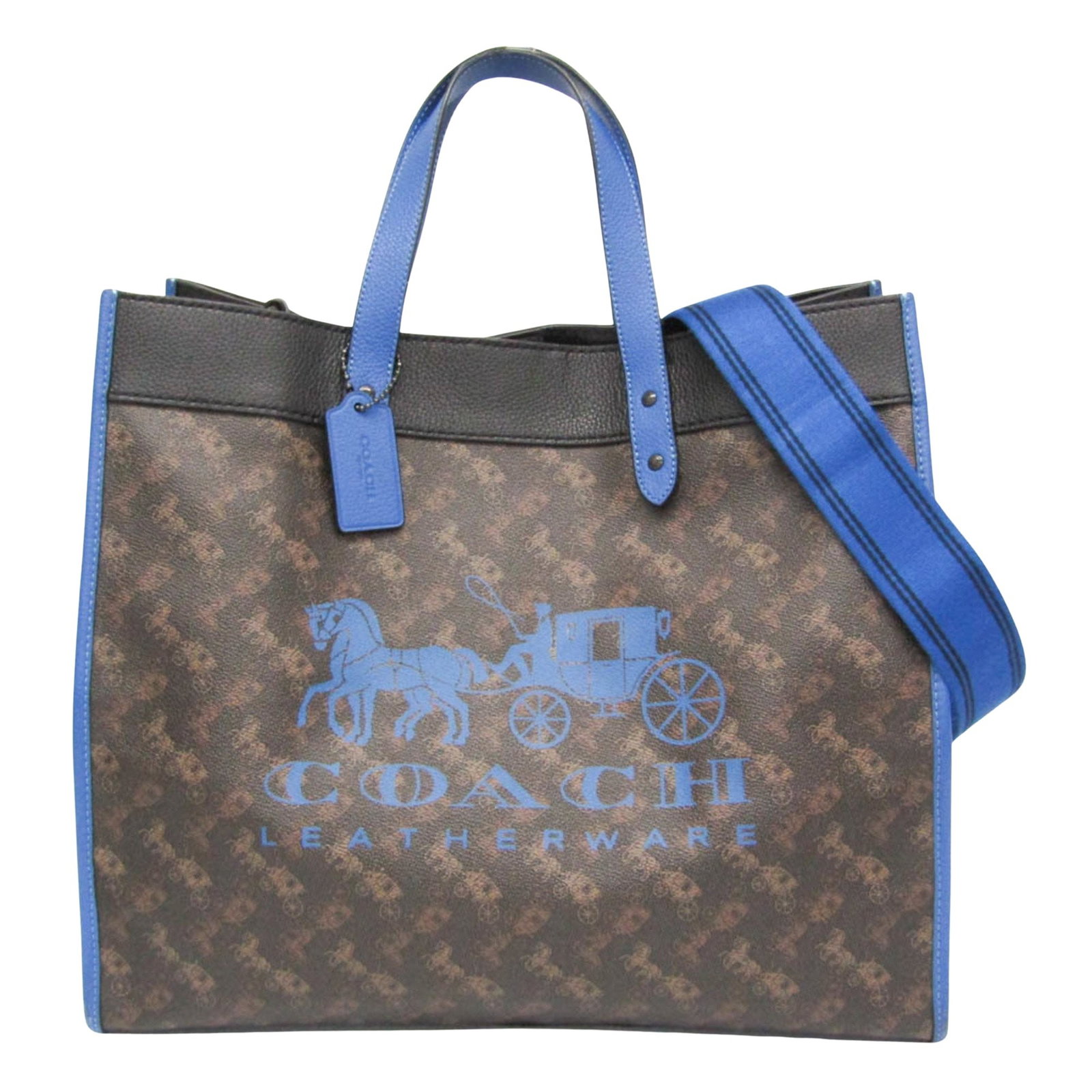 Coach Horse and Carriage Field Tote in Leather: Coach Horse and Carriage Field Tote in Leather This Coach Field Tote 40 features a Horse and Carriage print, crafted from leather and PVC in a striking combination of black, blue, and dark brown. It s