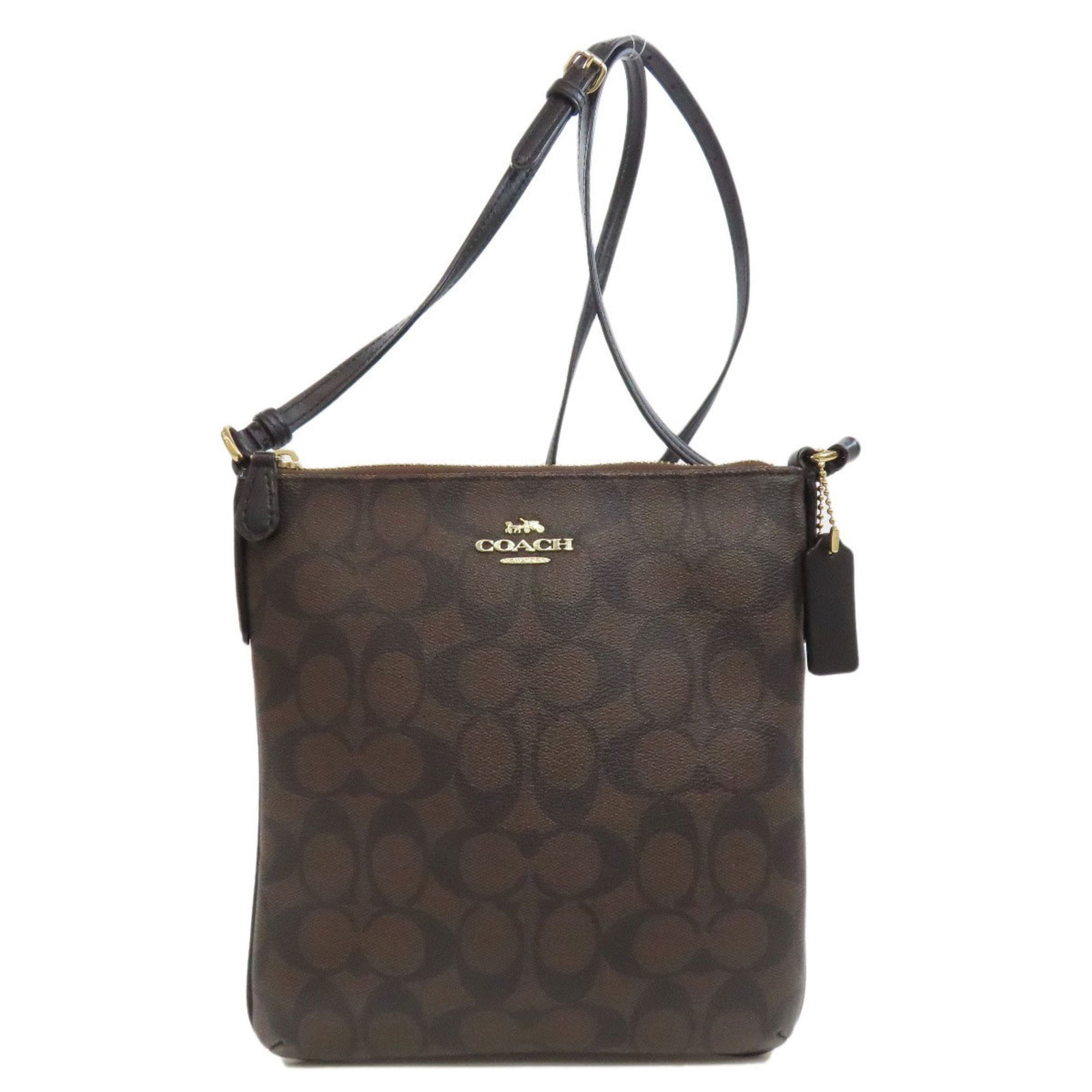 Coach F58309 Signature Shoulder Bag for Women COACH: Coach F58309 Signature Shoulder Bag for Women COACH Brand: Coach Line: Signature Model: F58309 Type: Shoulder bag Material: PVC PVC: Color: Brown Closure: Zipper Gender: Women Size (HxWxD): 21.5cm x 2