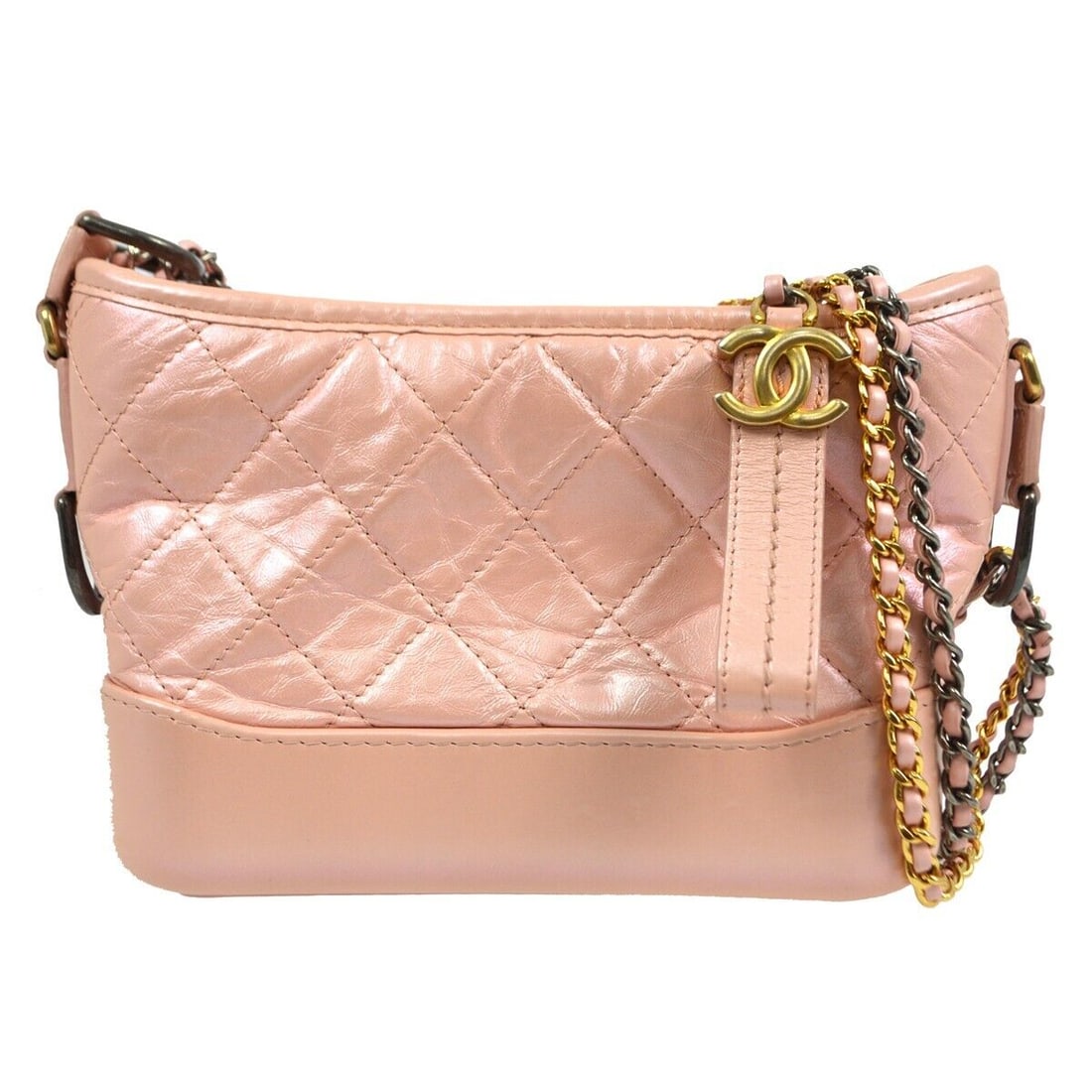 Chanel Pink Lambskin Gabrielle Shoulder Bag: Chanel Pink Lambskin Gabrielle Shoulder Bag Chanel Gabrielle Shoulder Bag crafted from baby pink lambskin features a medium size with a fabric lining. It has a chain strap and inner pockets for organi