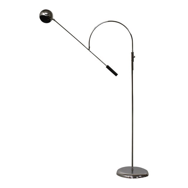 Robert Sonneman Orbiter Chrome Floor Lamp 62.75in Vintage Modern Design: Robert Sonneman Orbiter Chrome Floor Lamp 62.75in Vintage Modern Design This modern chrome 'Orbiter' floor lamp by Robert Sonneman features an adjustable and rotating arm. It measures 49 inches wide,