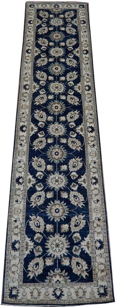 3x12 Navy Blue Chobi Zigler Peshawar Runner Rug: 3x12 Navy Blue Chobi Zigler Peshawar Runner Rug This exquisite 3 x 12 navy blue Chobi Zigler Peshawar runner rug features a stunning color palette of royal navy blue, ivory, and rust. Handcrafted from