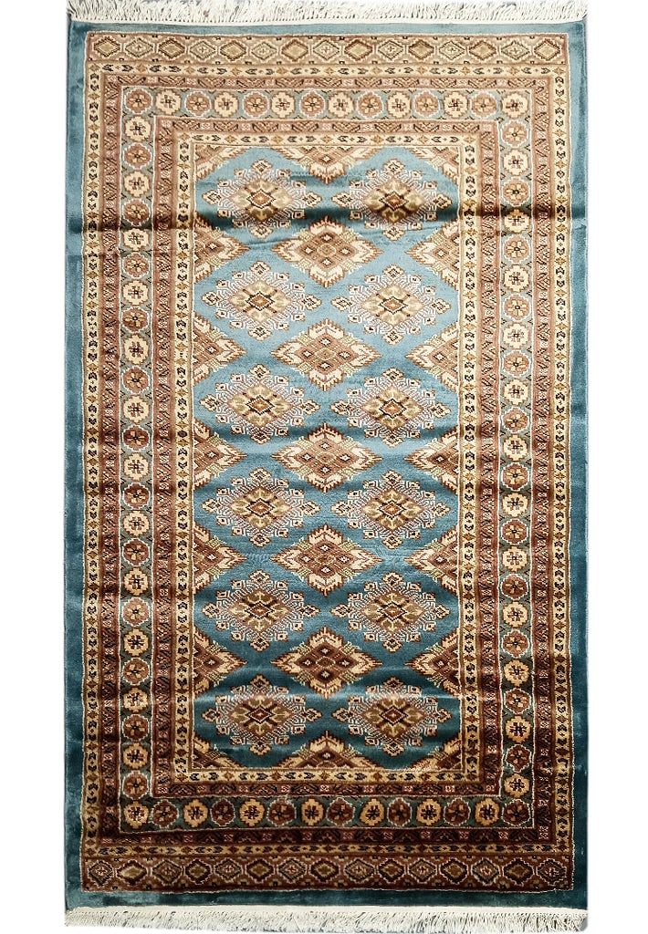 3x5 Blue Hand-Knotted Bokhara Area Rug from Pakistan: 3x5 Blue Hand-Knotted Bokhara Area Rug from Pakistan This exquisite 3 x 5 area rug features a beautiful Bokhara pattern in blue, expertly hand-knotted from a luxurious blend of wool and silk. Originat