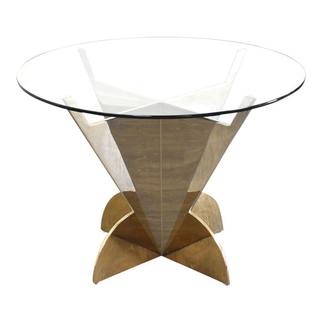 Brueton 40 Inch Round Chrome and Brass Dining Table: Brueton 40 Inch Round Chrome and Brass Dining Table This post-modern dining table features a sleek round design with a brass and chromed steel base topped with glass. Perfect for modern dining spaces,