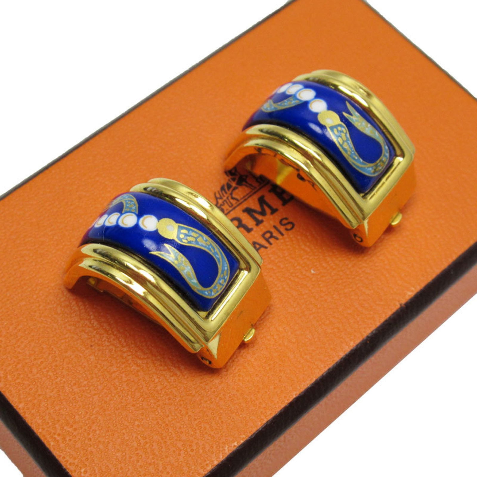 Hermes Cloisonne Enamel Clip Earrings in Gold and Blue for Women: Hermes Cloisonne Enamel Clip Earrings in Gold and Blue for Women These elegant clip earrings by Hermes feature a beautiful cloisonne and enamel design in a striking blue and gold color scheme. Crafted