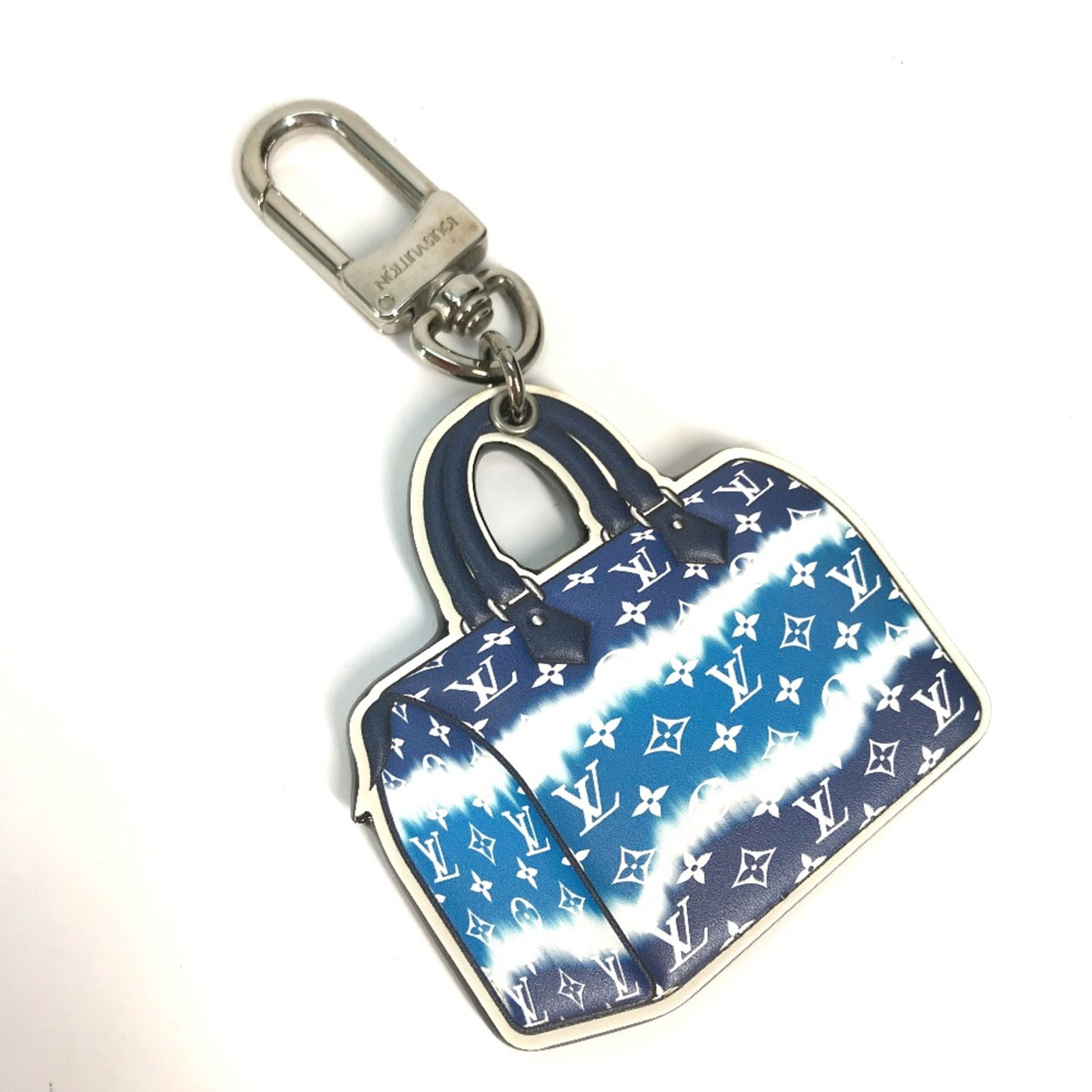 Louis Vuitton M69292 Blue White Leather Bag Charm Key Holder for Men 4.3in: Louis Vuitton M69292 Blue White Leather Bag Charm Key Holder for Men 4.3in This Louis Vuitton M69292 bag charm key holder features a stylish blue and white leather design. The accessory is perfect for