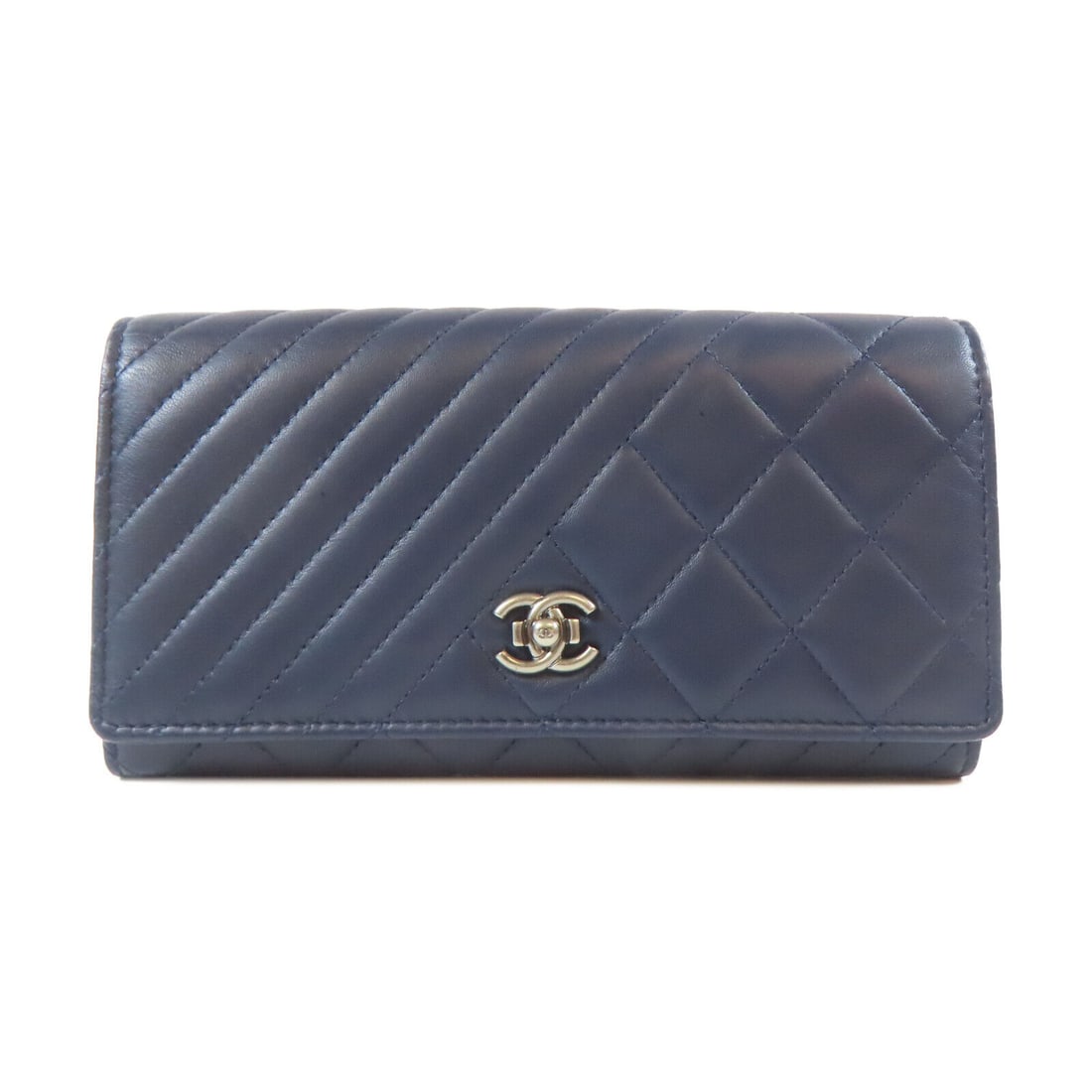 CHANEL Double Sided Long Wallet in Blue Lambskin Leather with Silver Hardware: CHANEL Double Sided Long Wallet in Blue Lambskin Leather with Silver Hardware This CHANEL double sided long wallet is crafted from premium lambskin leather in a stunning blue color. Features include a