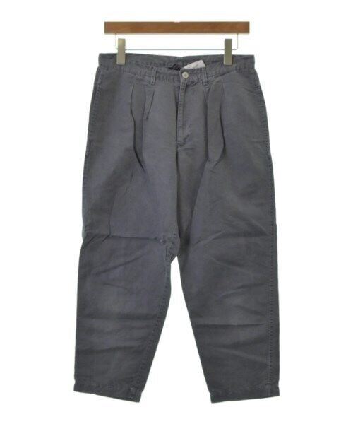COMME des GARCONS Gray Relaxed Fit Pants Size L: COMME des GARCONS Gray Relaxed Fit Pants Size L These COMME des GARCONS pants feature a stylish gray color with a relaxed fit and pleated front design. The size is approximately L, suitable for regula