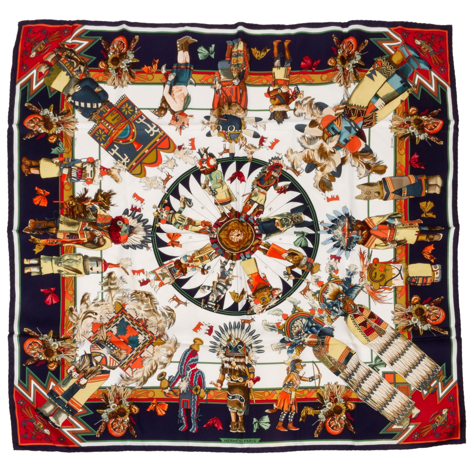 Hermes Navy Silk Kachinas Scarf by Kermit Oliver, 35 inches, France, 1990s: Hermes Navy Silk Kachinas Scarf by Kermit Oliver, 35 inches, France, 1990s This exquisite Hermes Kachinas scarf, designed by Kermit Oliver, features a vibrant Native American themed design with variou
