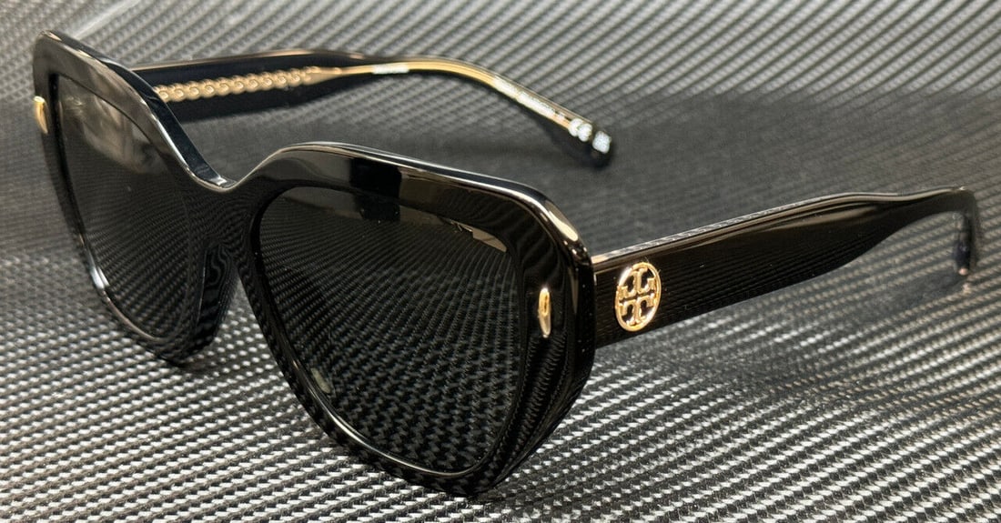 Tory Burch TY7194U 55mm Black Dark Grey Women's Sunglasses: Tory Burch TY7194U 55mm Black Dark Grey Women's Sunglasses Explore the stylish Tory Burch TY7194U sunglasses featuring a chic black and dark grey angular frame. The frame is adorned with a gold tone l